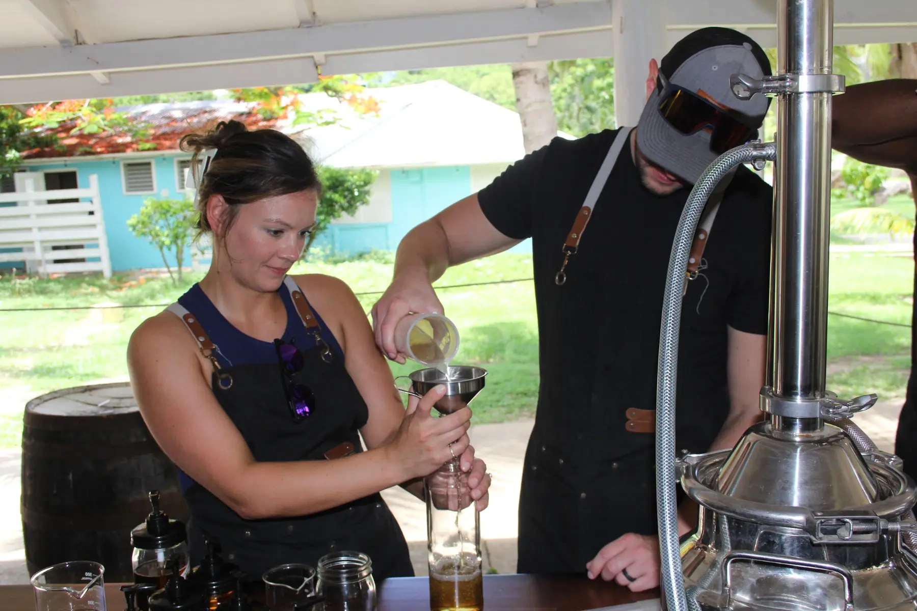Guests bottling rum together during an Academy of Rum session