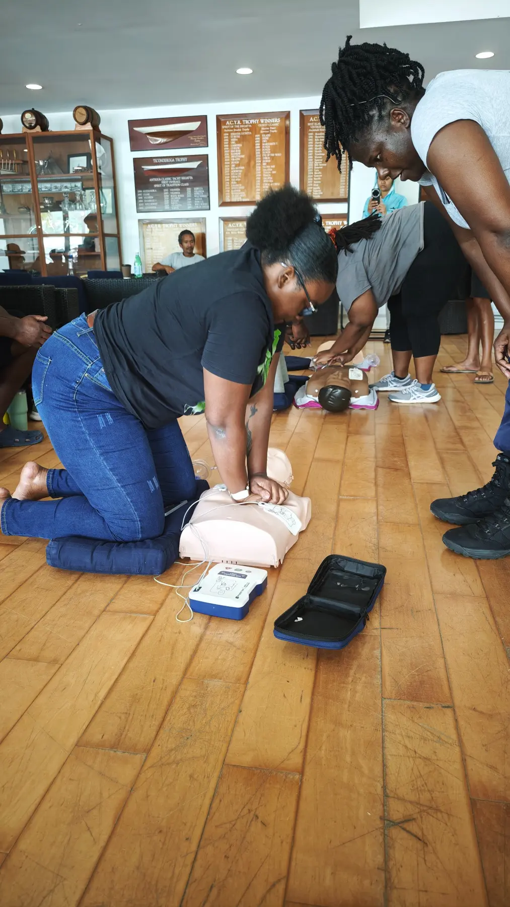 Academy instructors practising first-aid response techniques