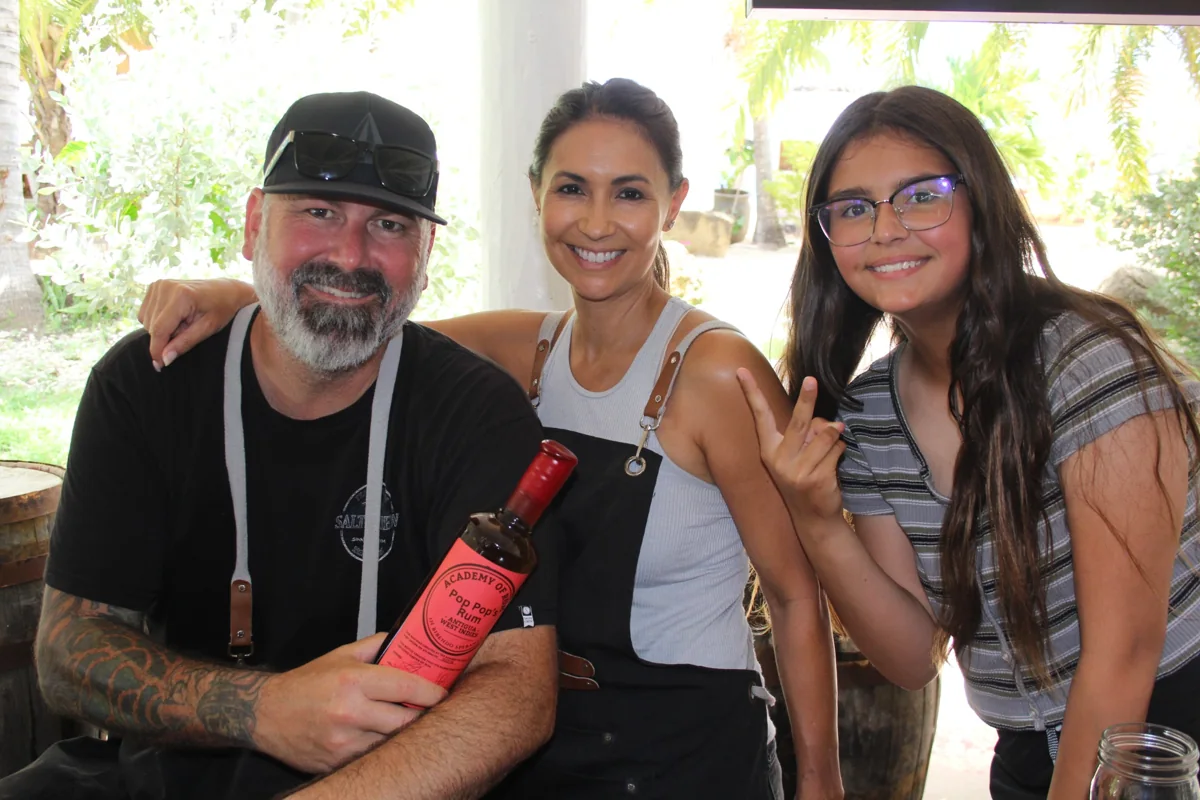 Three Academy guests posing with their finished creations
